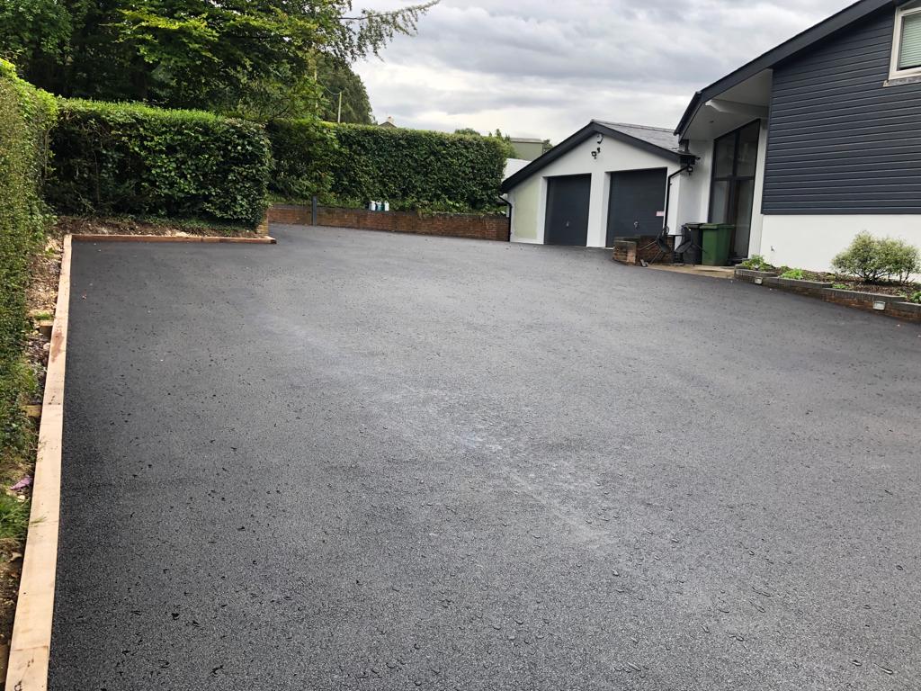 This is a photo of a asphalt driveway which is in the process of being installed by Forbes Road Tek